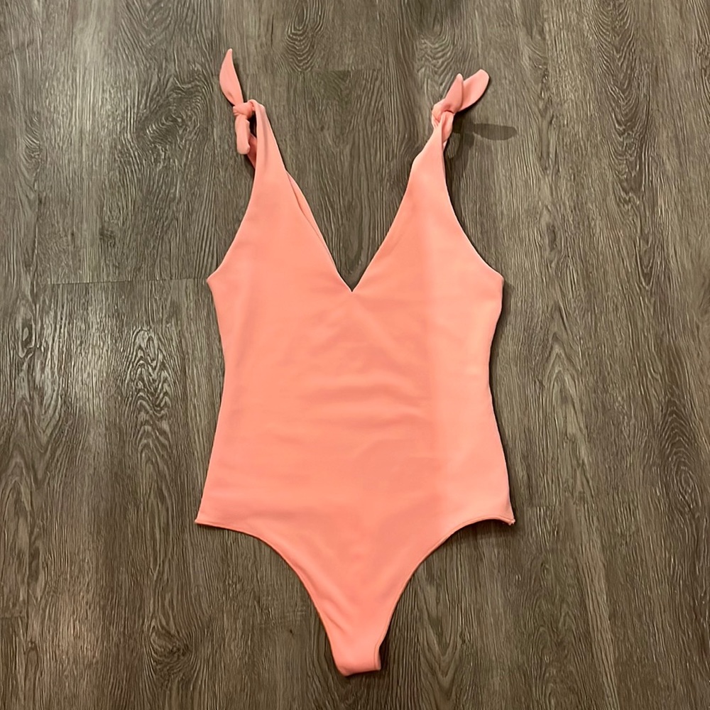 Pink bodysuit